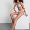 Bikiny s kostkovaným vzorem a lemováním s motivem sedmikrásky