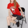 Bavlněné tričko Hello Kitty s volným střihem a motivem jahod