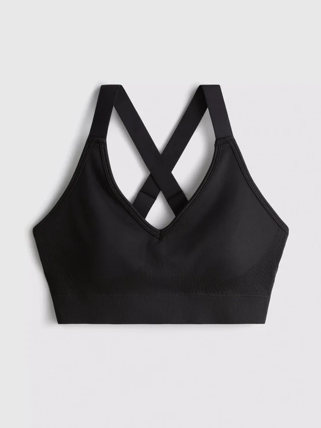 Bezešvý sportovní crop top s kříženými ramínky na zádech