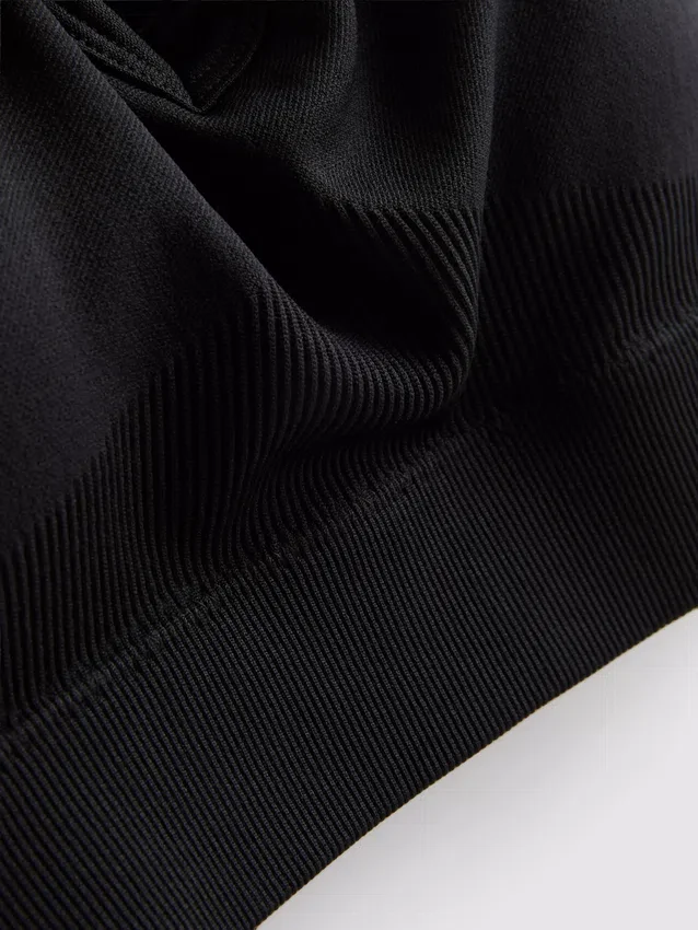 Bezešvý sportovní crop top s kříženými ramínky na zádech