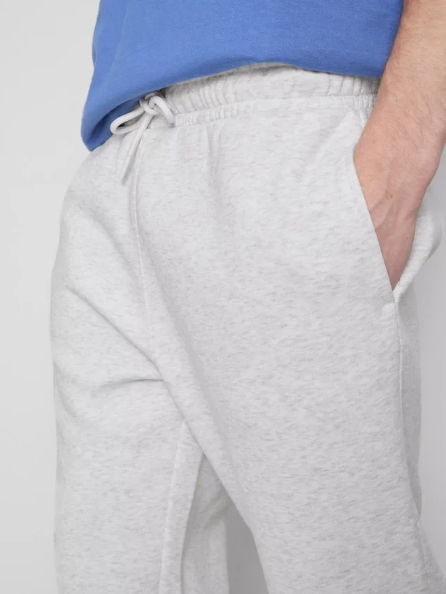 Elastické tepláky s manžetami