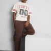 Košile s krátkým rukávem a grafickým potiskem v stylu „distressed“ z Tokia