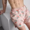 Kraťasy s texturou a motivem plameňáků