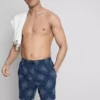 Kraťasy s vyšívaným motivem slunce