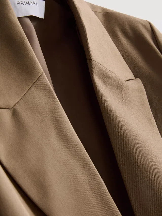 Oversized sako s jedním řadem knoflíků