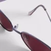 Oválné sluneční brýle s tónovanými skly ve stylu 90. let