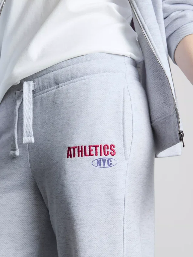 Sportovní tepláky s širokými nohavicemi ze směsi bavlny