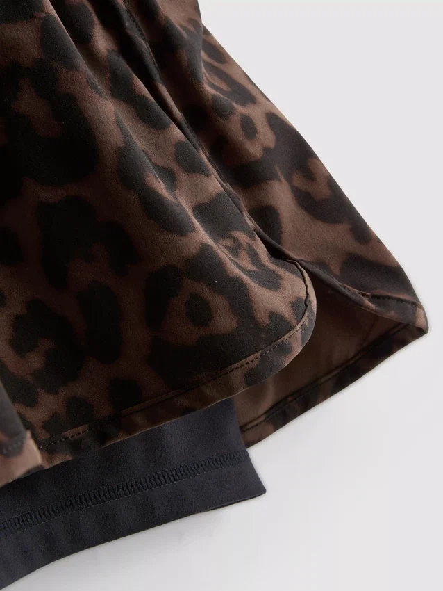 Tkané běžecké kraťasy s leopardím vzorem